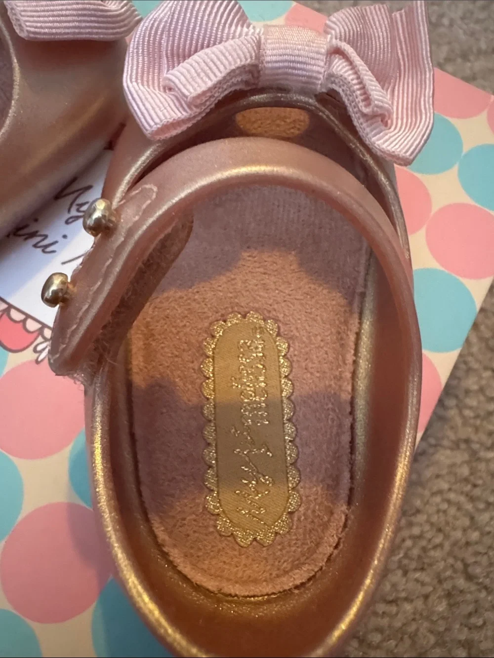 Mini Melissa Metallic Rose Gold Mary Janes with Pink Fabric Bows. Used w/box
